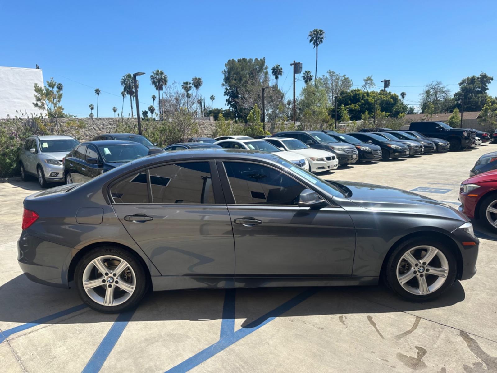 2014 Gray /Black BMW 3-Series leather (WBA3B1C52EK) with an 4 Cylinder engine, Automatic transmission, located at 30 S. Berkeley Avenue, Pasadena, CA, 91107, (626) 248-7567, 34.145447, -118.109398 - Moon-roof! Premium package! this 2014 BMW 3-Series 320i Sedan looks and drives well. Looking for a reliable and stylish vehicle in Pasadena, CA? Look no further! We have this sleek 2014 BMW 3-Series 320i Sedan available at our dealership. Whether you have perfect credit or are concerned about your c - Photo #5